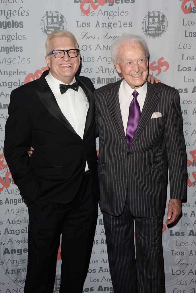 TV host/actor Drew Carey and Bob arrive at the National Arts and Entertainment Journalism Awards Gala in 2015