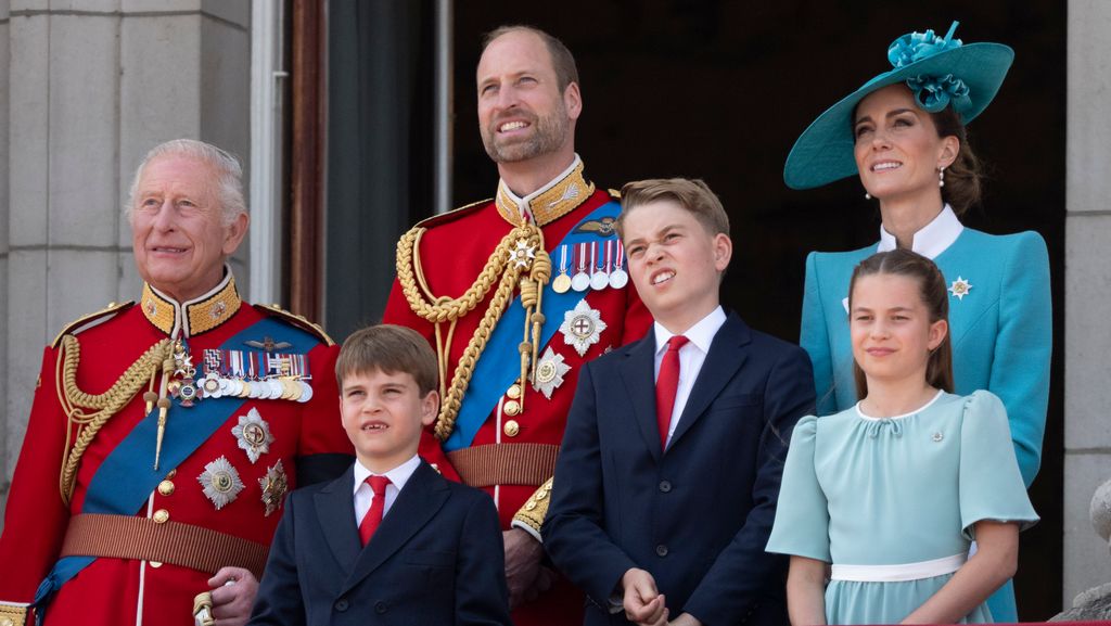 King Charles standing with Prince William, Prince Louis, Prince George, Kate Middleton and Princess Charlotte