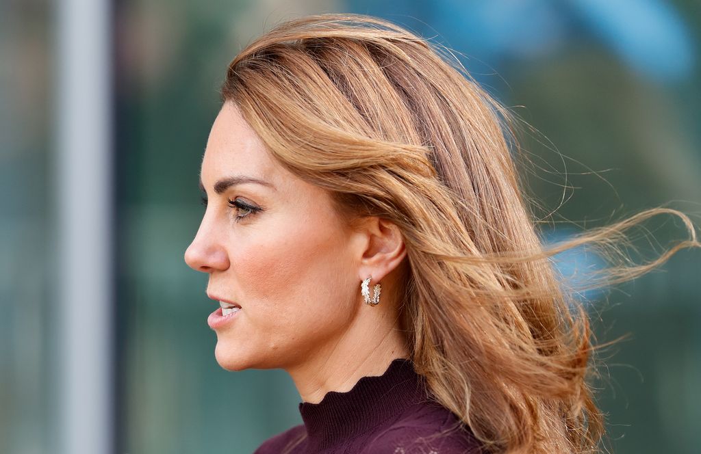 Kate side on with windswept hair