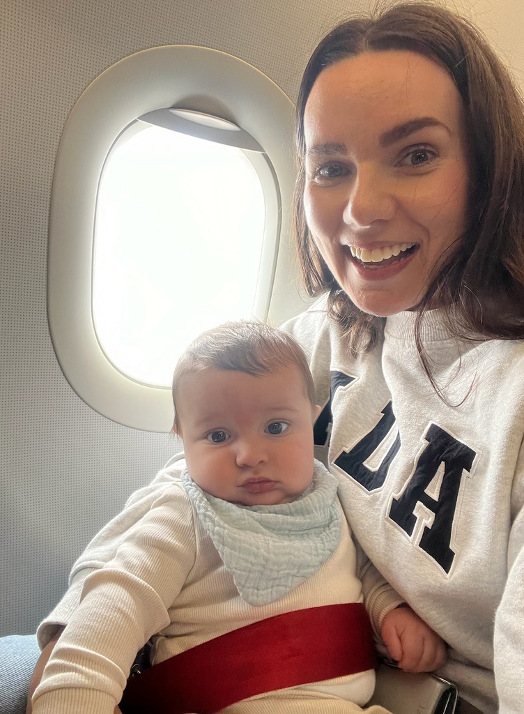 mother and baby on plane