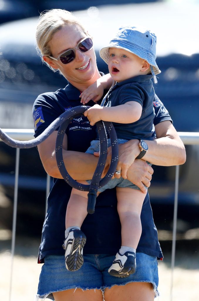Zara Tindall holding a baby Lucas Tindall