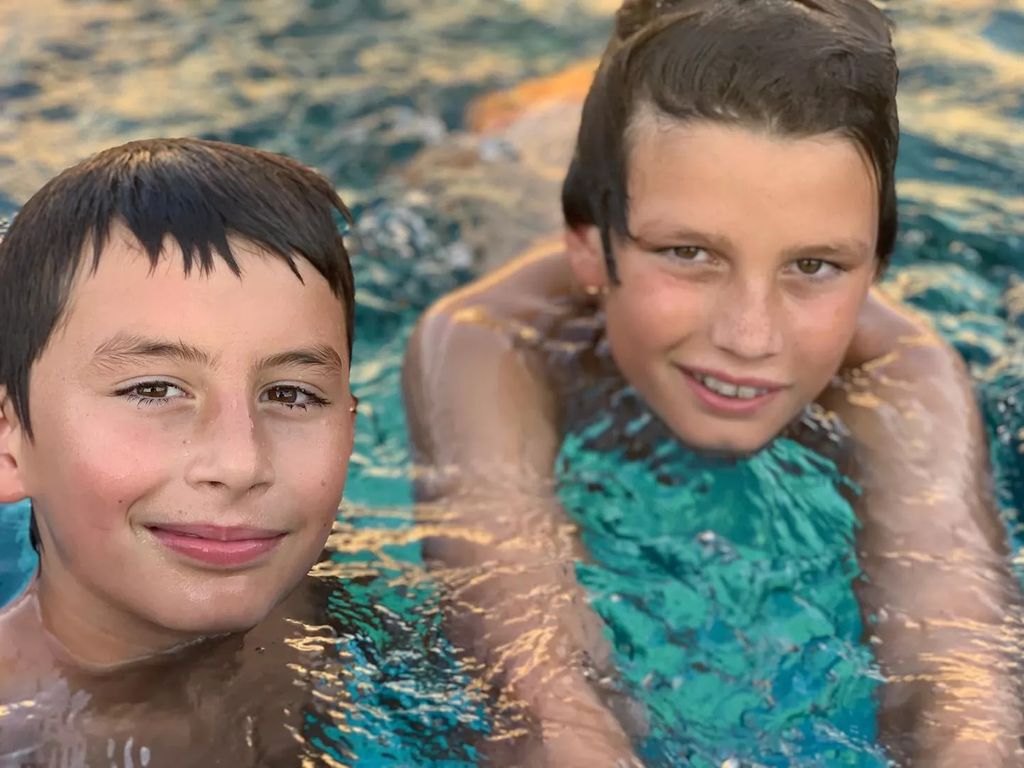 Benjamin Brady swims alongside older brother Jack