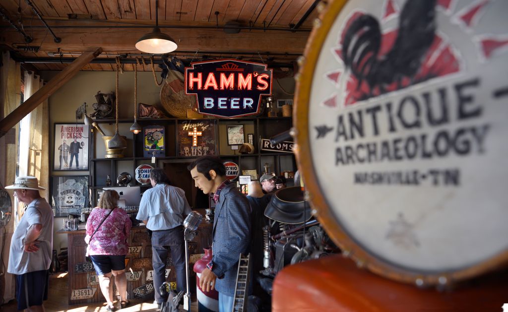 Tourists visit the Antique Archaeology shop in Nashville, Tennessee. The shop is among businesses housed in the historic Marathon Motor Works building where Marathon automobiles were made from 1910 until 1914. Today the brick building, known as Marathon Village, houses numerous shops, restaurants and the Antique Archaeology antique shop which is featured on the popular History Channel reality television show, 'American Pickers.'