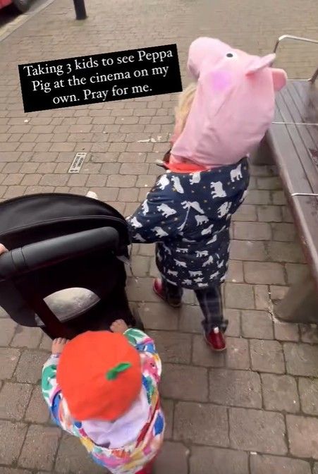 Carrie Johnson walking to the cinema with her children
