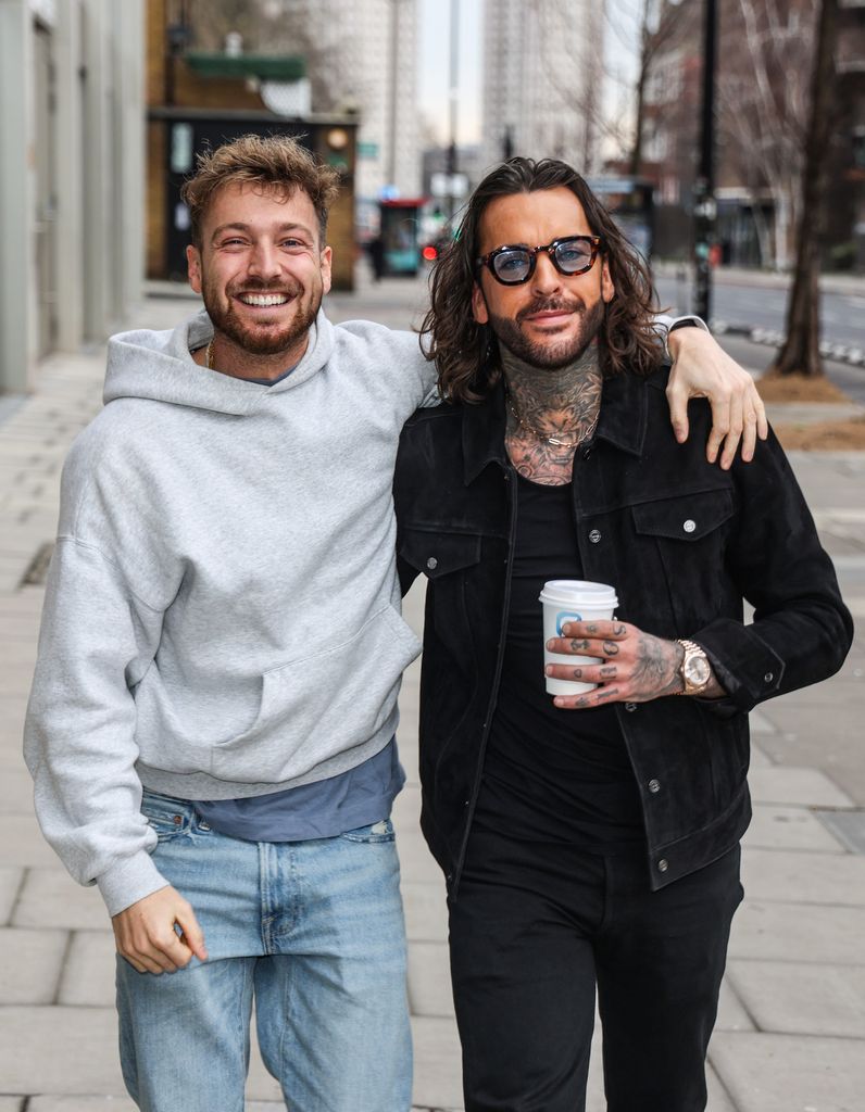 Sam Thompson seen smiling back at work with his podcast co-host Peter Wicks while Pete promotes new dog show!