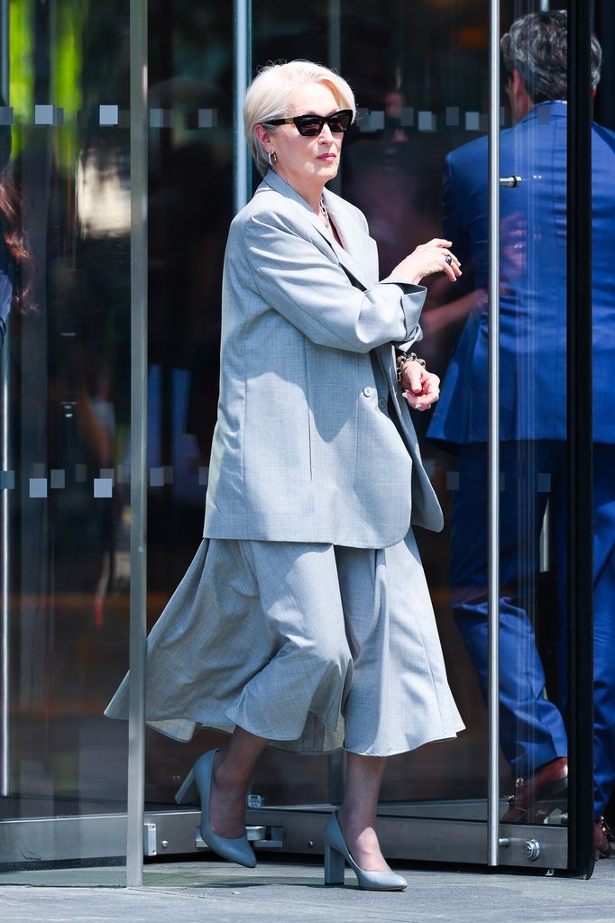 Meryl Streep wearing a grey outfit on the set of The Devil Wears Prada 2
