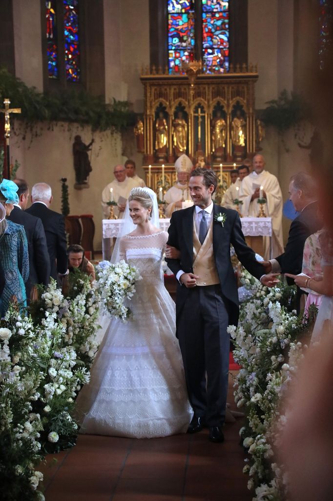 bride and groom walking down aisle