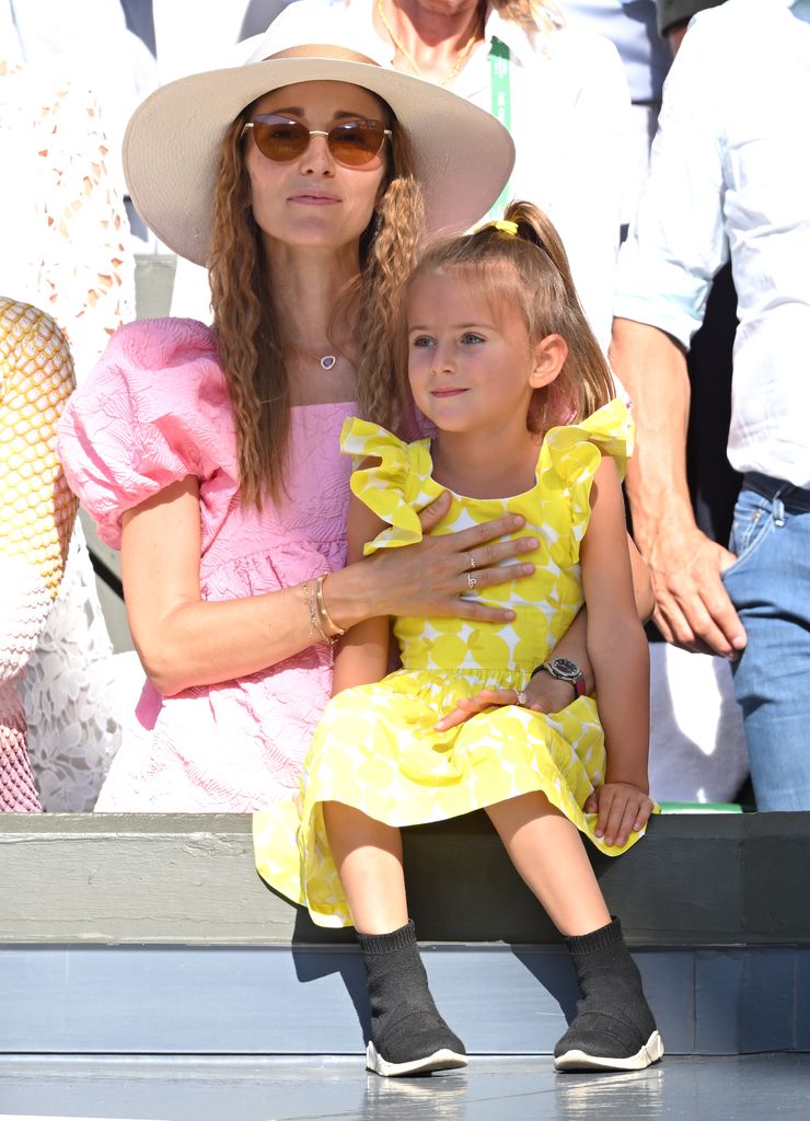 Jelena Djokovic and Tara Djokovic watching Wimbledon Tennis Championships in 2022