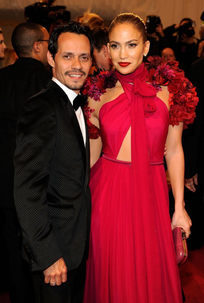 Marc Anthony in tuxedo and Jennifer Lopez in red dress at the 2011 Met Gala