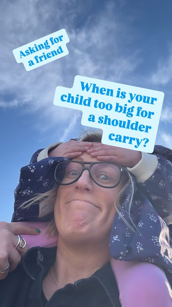 mother walking with daughter sat on shoulders