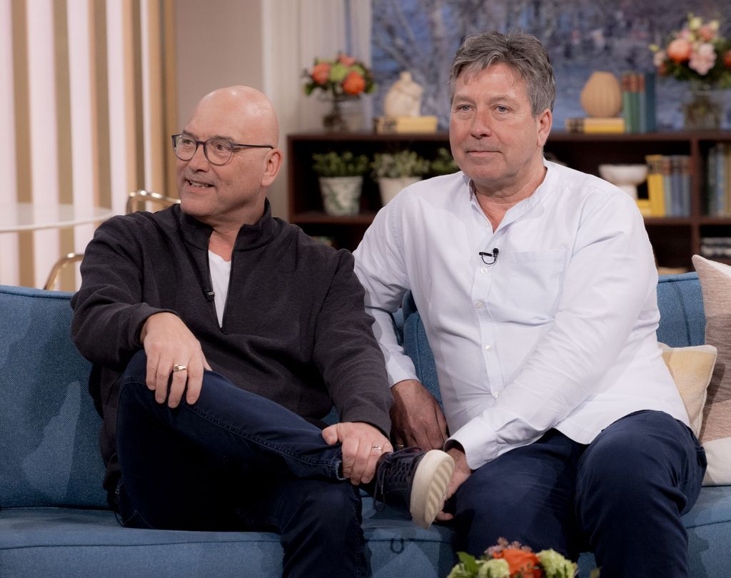 Gregg Wallace sitting with John Torode on a sofa