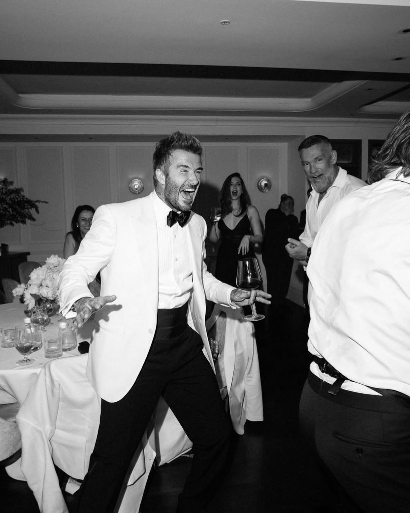Ana de Armas in background David Beckham foreground