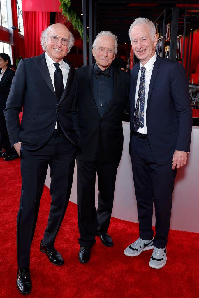 (L-R) Larry David, Michael Douglas, and John McEnroe attend the 2024 Vanity Fair Oscar Party 