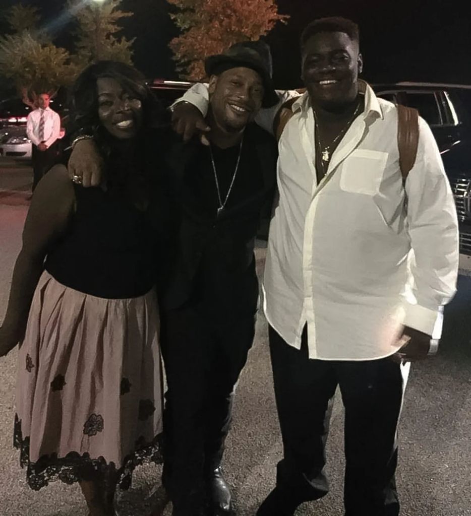 D'Angelo and Angie Stone pose for a photo with their son Michael Archer II aka Swayvo Twain, shared on Instagram