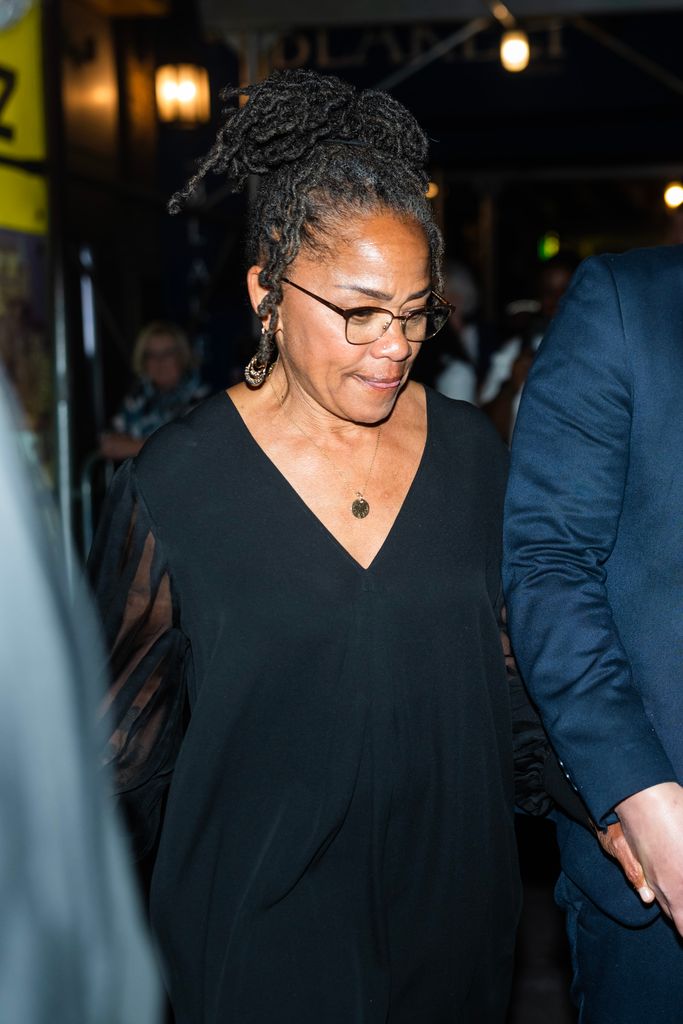 Doria Ragland in a dark outfit