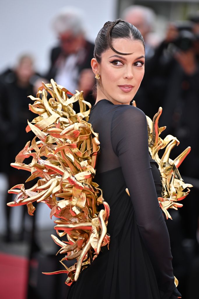 CANNES, FRANCE - MAY 15: Iris Mittenaere attends the "Furiosa: A Mad Max Saga" (Furiosa: Une Saga Mad Max) Red Carpet at the 77th annual Cannes Film Festival at Palais des Festivals on May 15, 2024 in Cannes, France. (Photo by Stephane Cardinale - Corbis/Corbis via Getty Images)