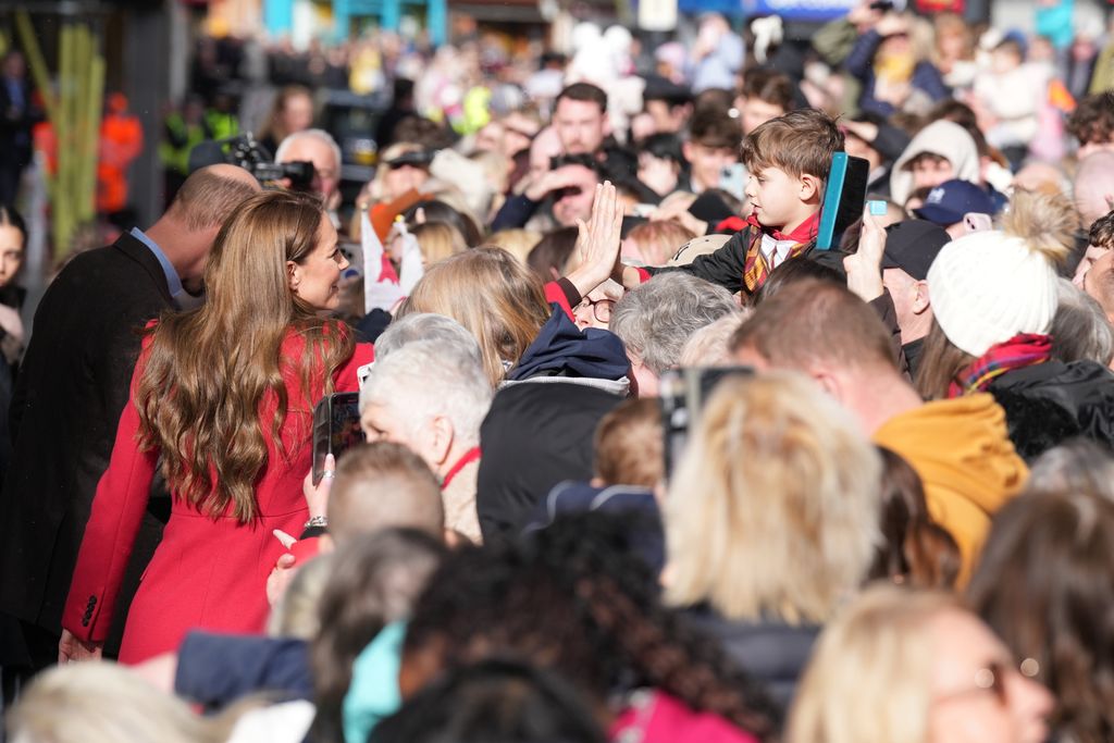 Kate Middleton high-fives little boy in the crowd in Pontypridd