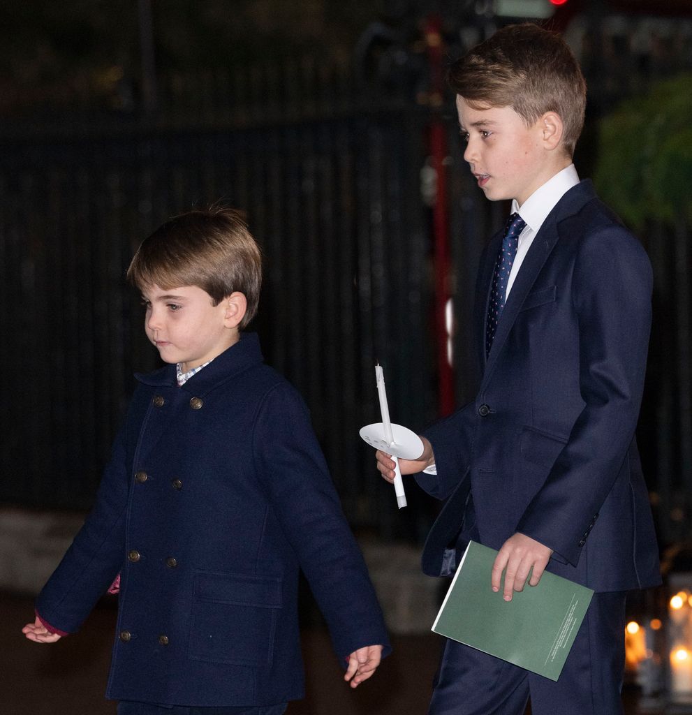 Prince Louis of Wales and Prince George of Wales attend The "Together At Christmas" Carol Service at Westminster Abbey on December 8, 2023 in London, England.