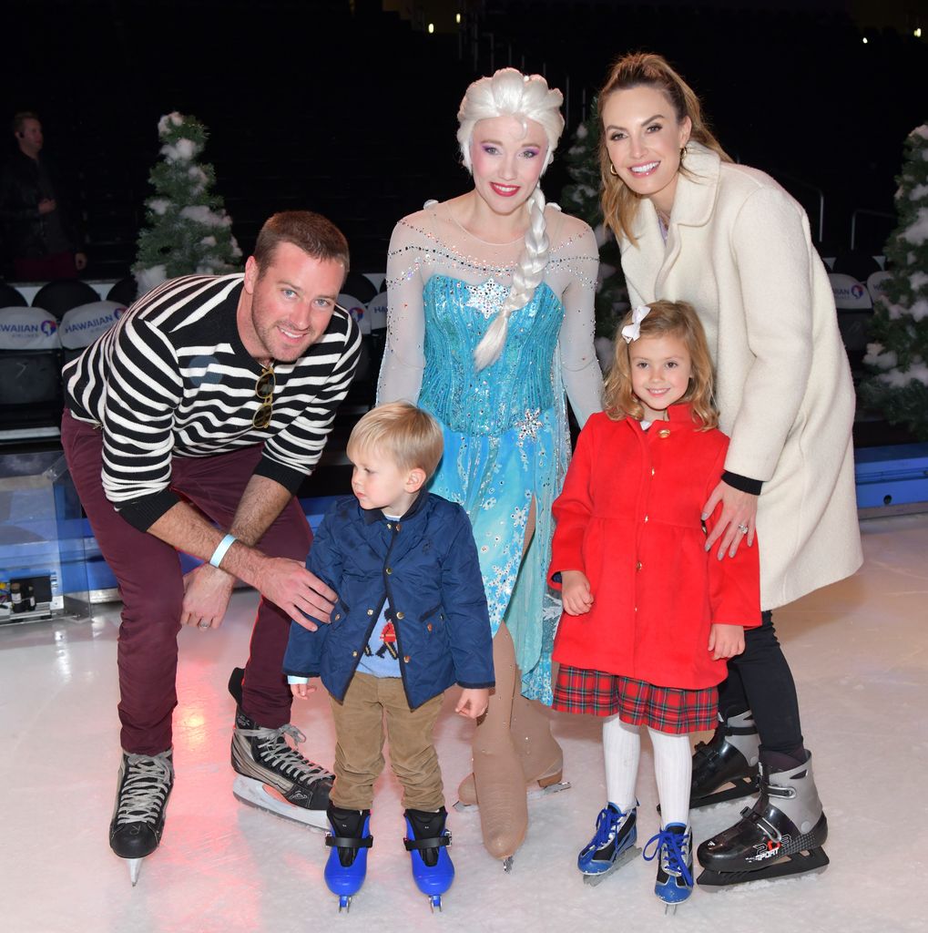 Armie Hammer, Ford Armand Douglas Hammer, "Elsa," Harper Grace Hammer, and Elizabeth Chambers pose for portrait at 2019 Disney On Ice "Mickey's Search Party" at Staples Center on December 13, 2019 in Los Angeles, California