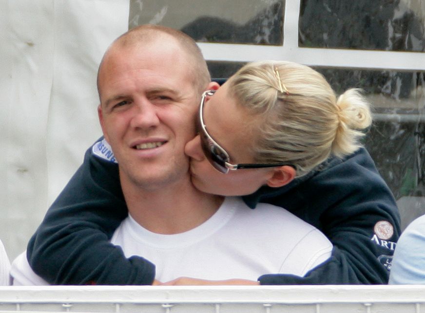 Zara Phillips kisses husband Mike Tindall as they attend day 3 of The Festival of British Eventing at Gatcombe Park on August 7, 2011 in Stroud, England