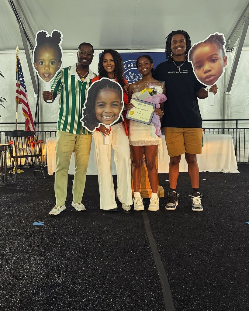 Nate Burleson with wife Atoya, daughter Mia and son Nehemiah at Mia's eighth grade graduation