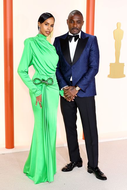 sabrina elba in green silk dress with husband idris elba