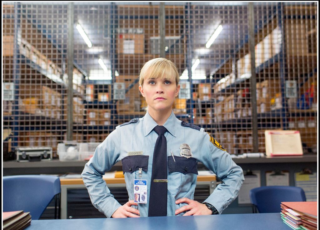 Reese Witherspoon as a police officer in Hot Pursuit