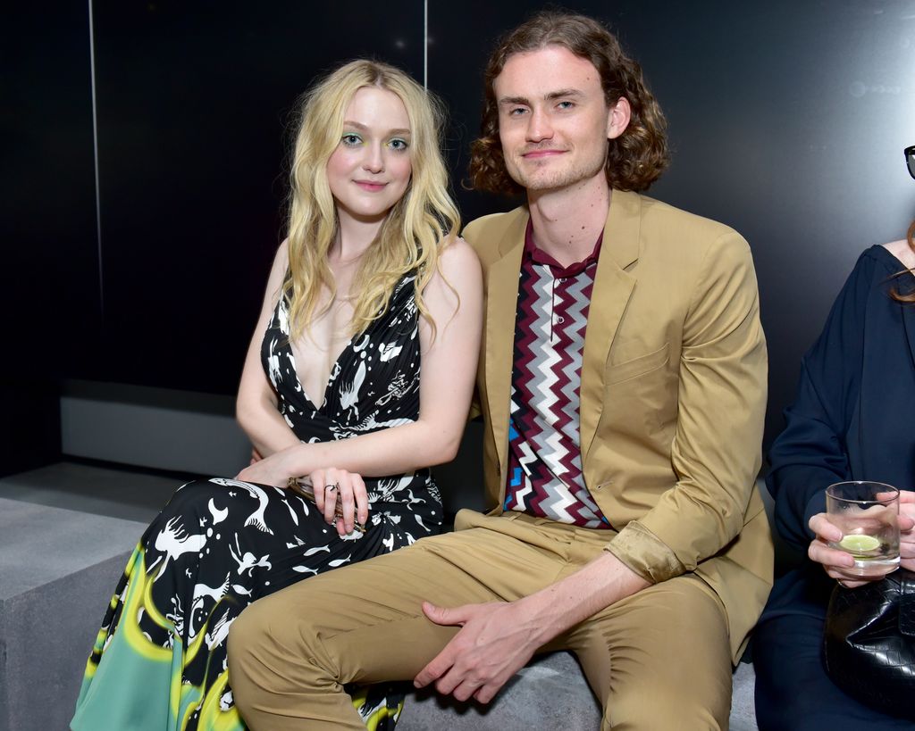 Actor Dakota Fanning and Henry Frye attend the Prada Resort 2019 fashion show on May 4, 2018 in New York City