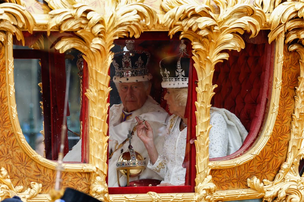 King Charles III and Queen Camilla travelling in the Gold State Coach built in 1760 and used at every Coronation since that of William IV in 1831