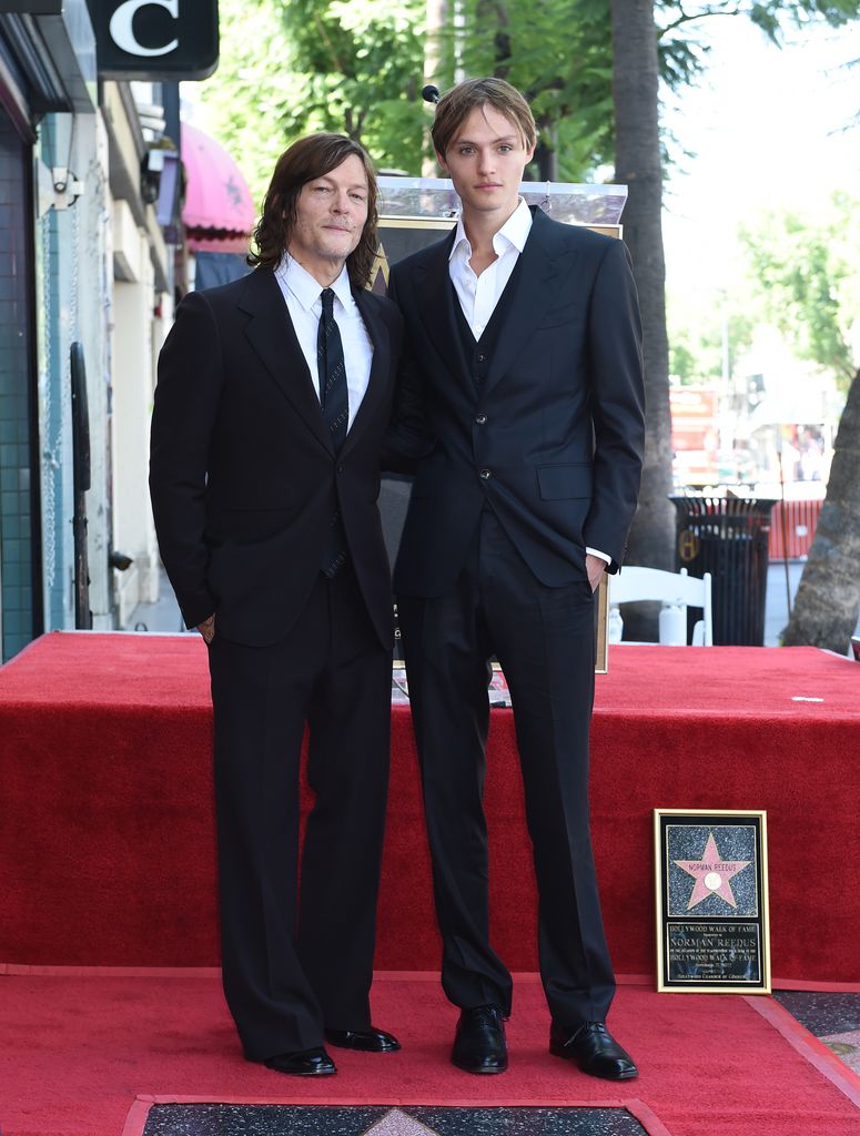 Norman Reedus and Mingus Reedus in suits at the star ceremony where Norman Reedus is honored with a star on the Hollywood Walk of Fame on September 27, 2022