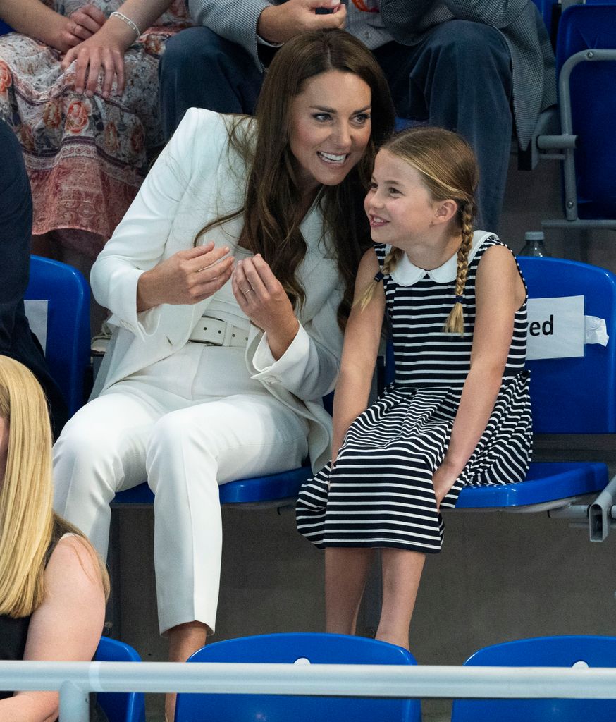 Kate Middleton with Princess Charlotte of Cambridge at the swimming during the 2022 Commonwealth Games on August 2, 2022 in Birmingham, England