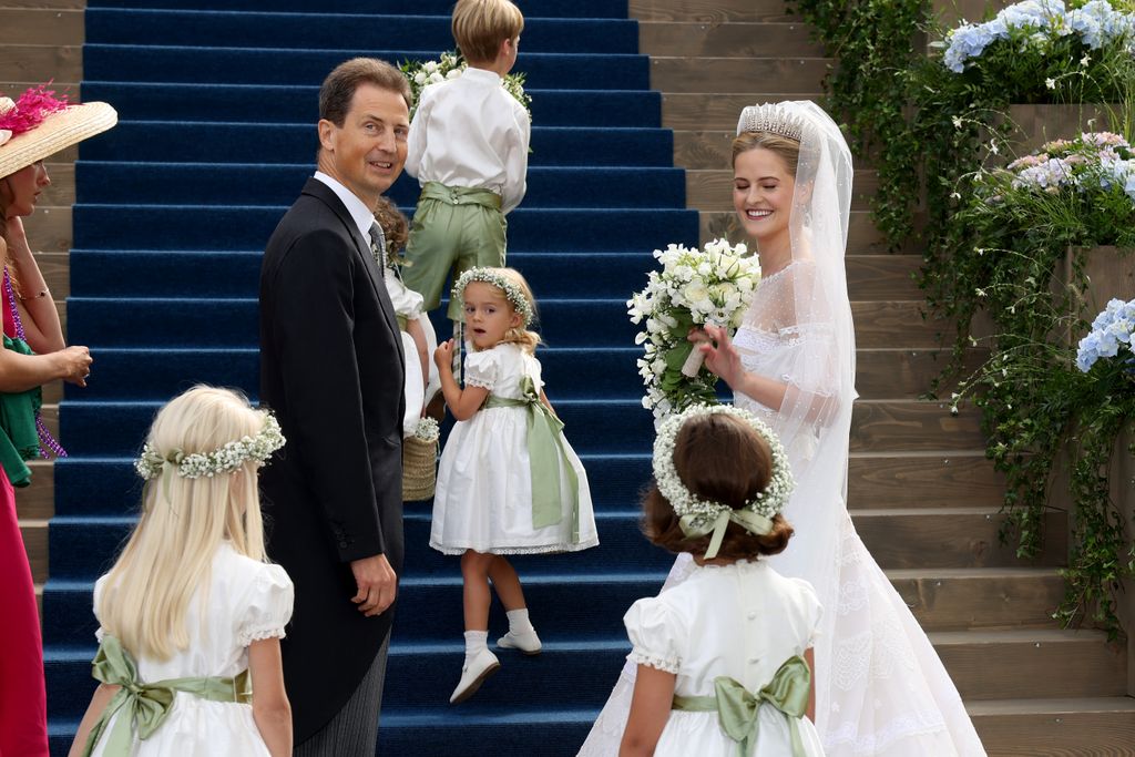 Alois, Hereditary Prince of Liechtenstein and Princess Marie Caroline Of Liechtenstein arrive at the wedding of Princess Marie Caroline of Liechtenstein To Mr Leopoldo Maduro Vollmer at Cathedral of St. Florin 