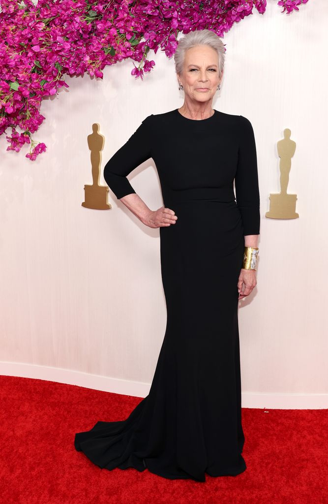 Jamie Lee Curtis attends the 96th Annual Academy Awards in a black gown
