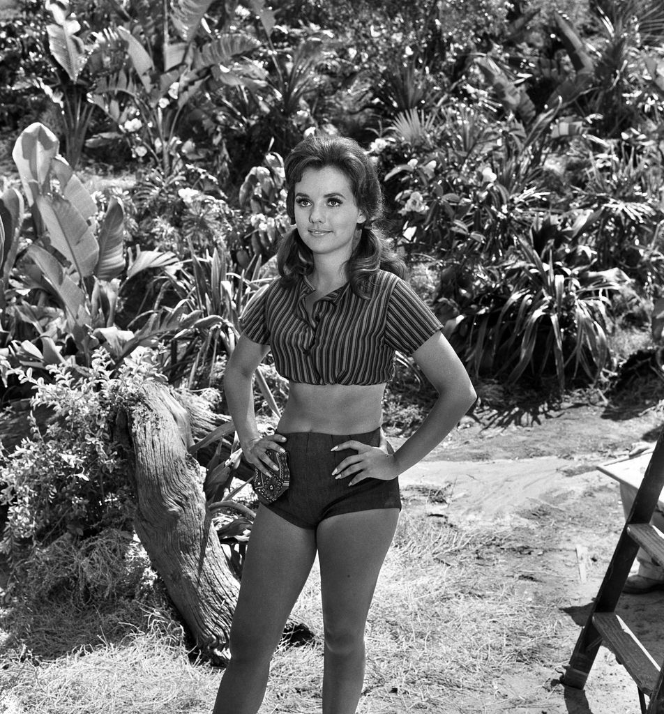 Dawn in a top and shorts