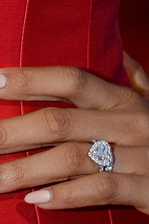 Rochelle Humes wearing a red dress and a heart-shaped ring
