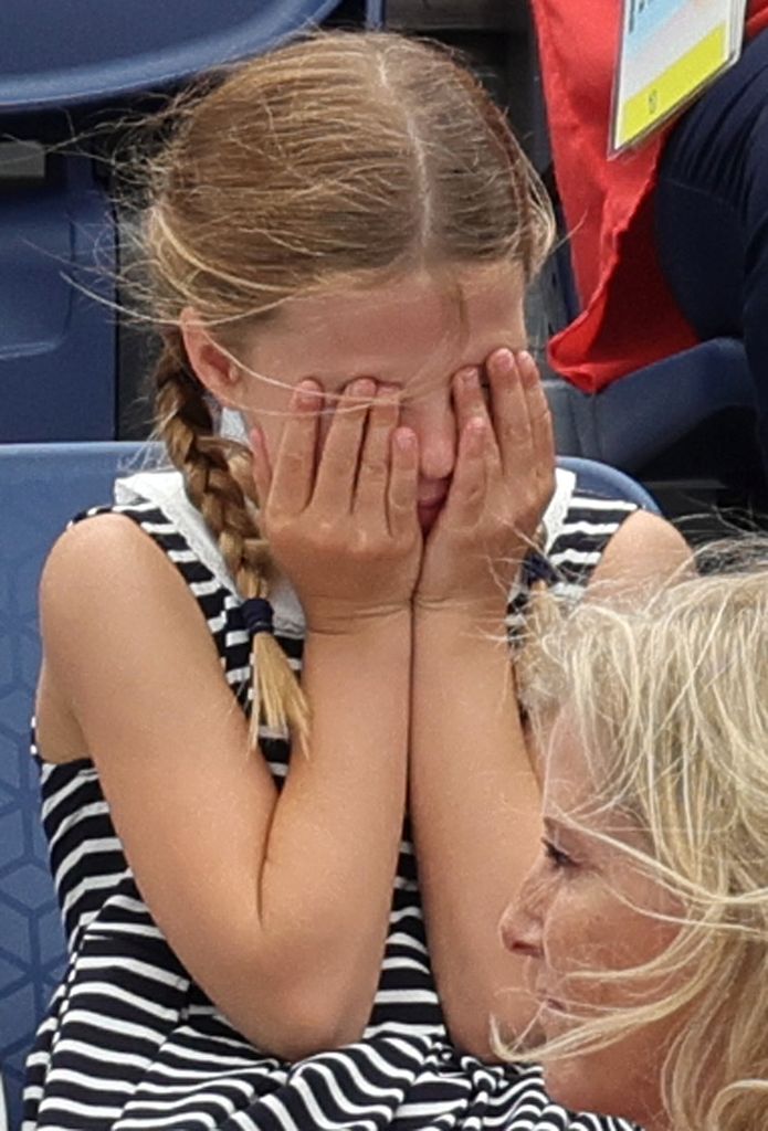 Charlotte with hands over eyes