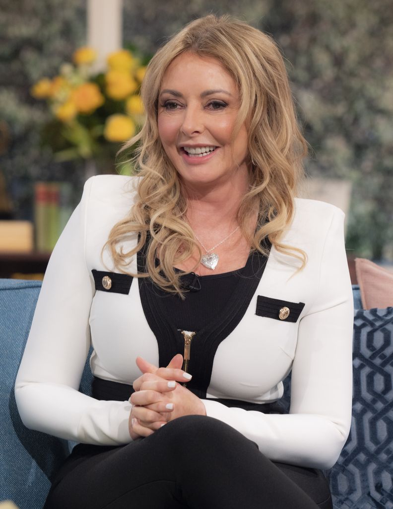 Carol Vorderman in a smart black and white blazer on This Morning