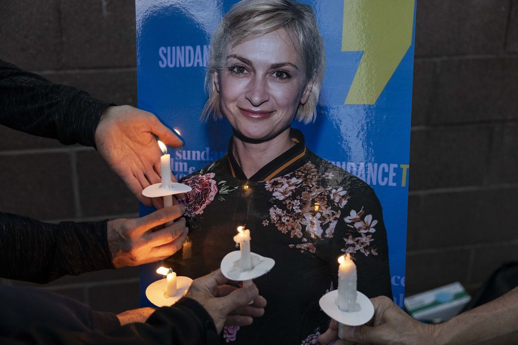 Locals and members of the local film community mourn the loss of cinematographer Halyna Hutchins, who died after being shot by Alec Baldwin on the set of his movie "Rust" at a vigil in Albuquerque, New Mexico, U.S., October 23, 2021