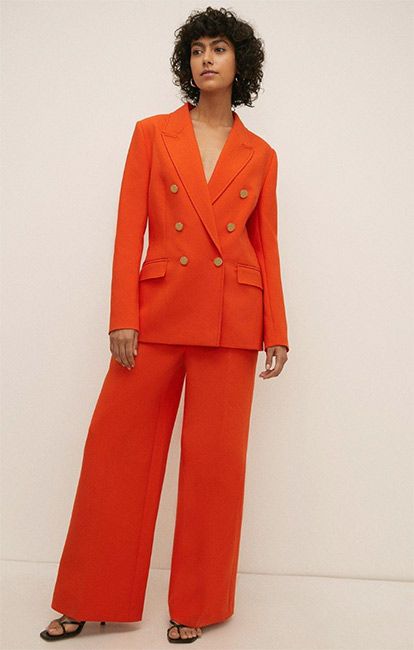 oasis orange suit