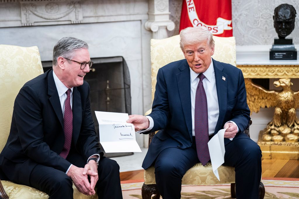 President Donald J Trump is given a letter from King Charles III, by British Prime Minister Keir Starmer 