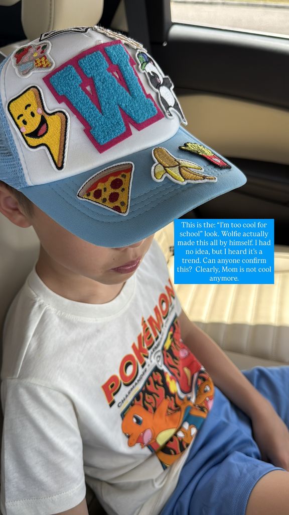 young boy wearing personalised baseball cap