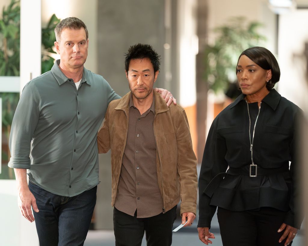 Peter Krause, Kenneth Choi and Angela Bassett in 911
