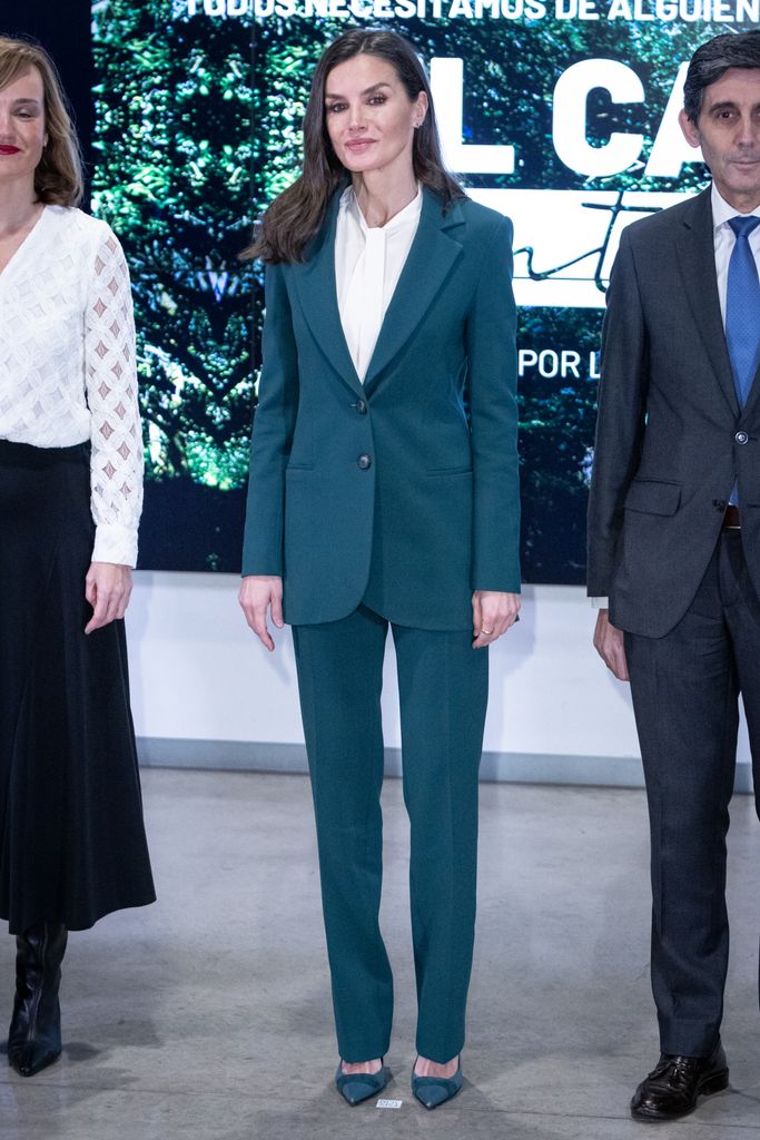 Letizia in green power suit