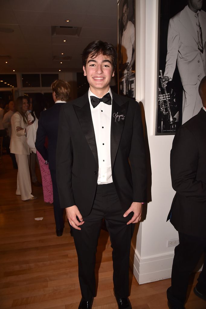 photo of august hermann in black tux