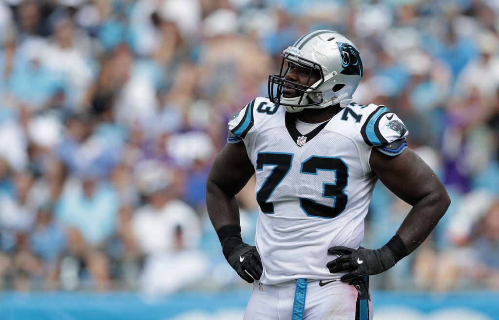 Michael Oher #73 of the Carolina Panthers watches a replay against the Minnesota Vikings in the 3rd quarter during their game at Bank of America Stadium on September 25, 2016 in Charlotte, North Carolina.