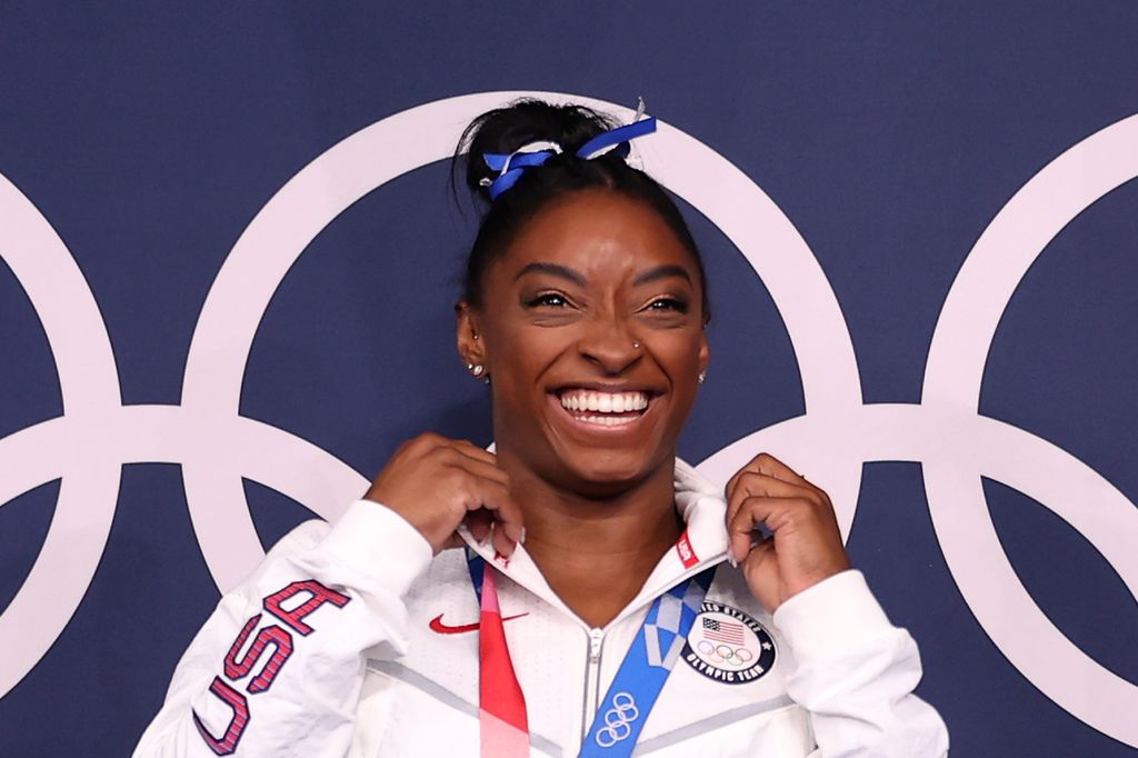 Simone Biles of Team United States poses with the bronze medal following the Women's Balance Beam Final on day eleven of the Tokyo 2020 Olympic Games at Ariake Gymnastics Centre on August 03, 2021 in Tokyo, Japan