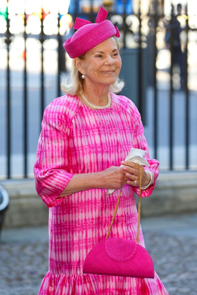  woman in pink dress and hat