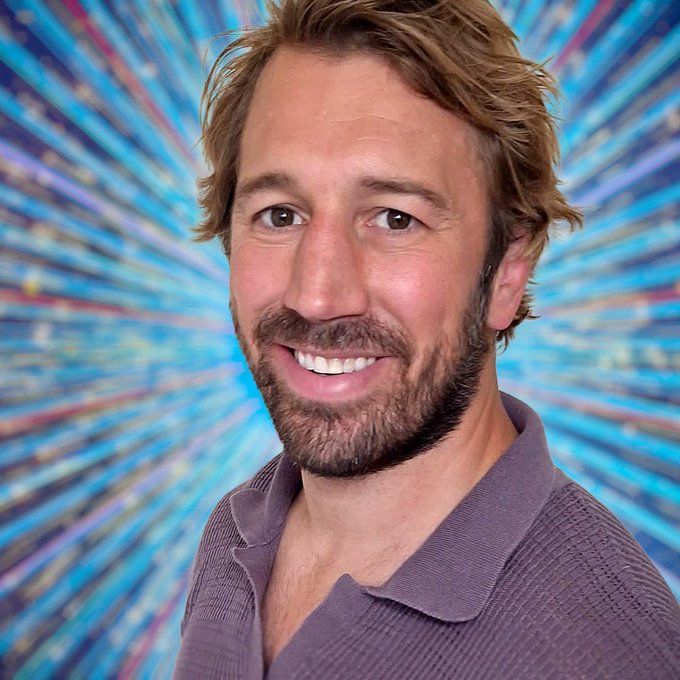 headshot of man with beard