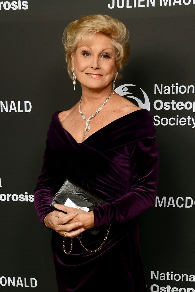 LONDON, ENGLAND - NOVEMBER 21:  Angela Rippon attends the Julien Macdonald Fashion Show for National Osteoporosis Society at Lancaster House on November 21, 2018 in London, England. (Photo by Dave J Hogan/Dave J Hogan/Getty Images for the National Osteoporosis Society)