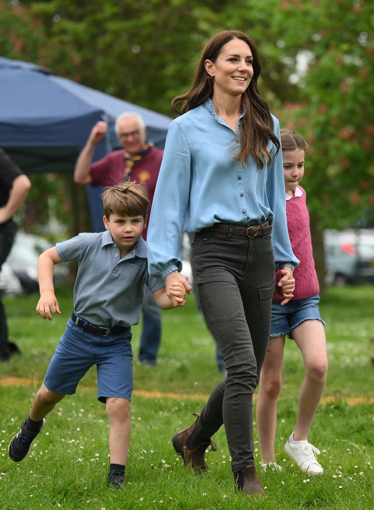 Kate Middleton, Prince Louis and Princess Charlotte walk